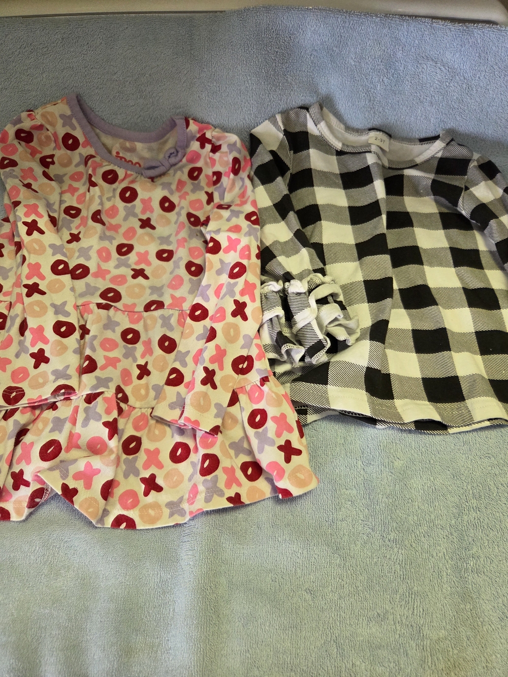 Circo Pink & Red Kiss and Hug Top & Black & White checkered Top.